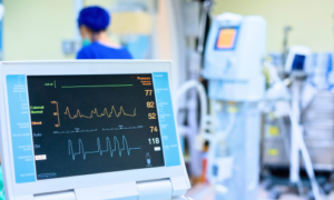 EKG machine in a hospital setting. This picture emphasizing the importance of calibration of medical devices such as the EKG machine. 