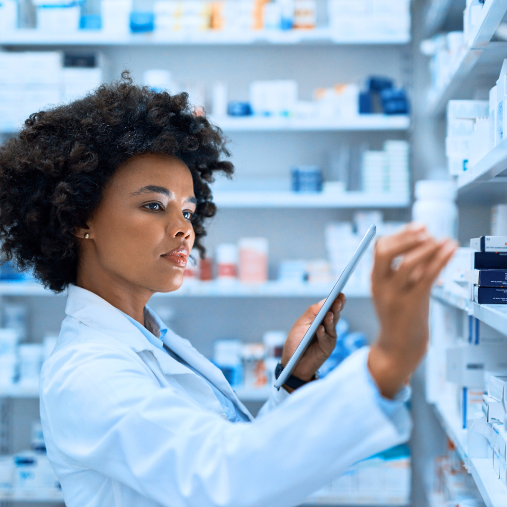 USP 797 compliance checklist for pharmacy review with tablet at medication shelves