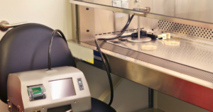 Controlled environment services equipment beside a biological safety cabinet