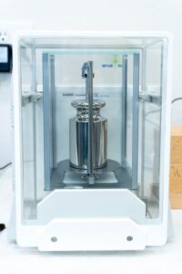 Mass calibration services weight standard on a Mettler Toledo analytical balance pan